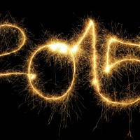 New Year 2015 formed from sparking digits over black background